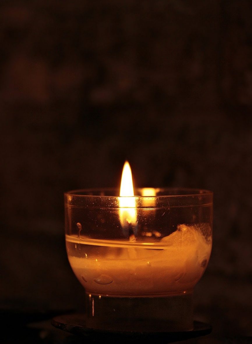 Candle in glass dish